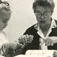 photo of Dr. Empress Zedler working a child in the clinic